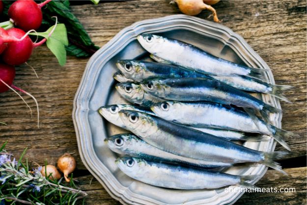 Raw Sardines/Mathi Meen decorated with vegetables