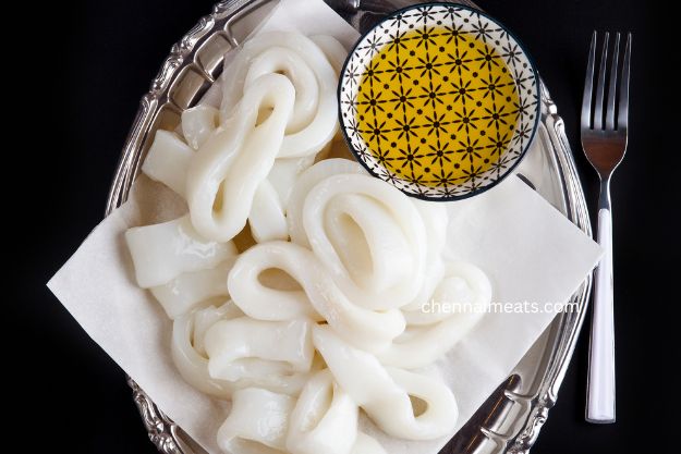 Raw Squid Calamari Rings decorated on the plate